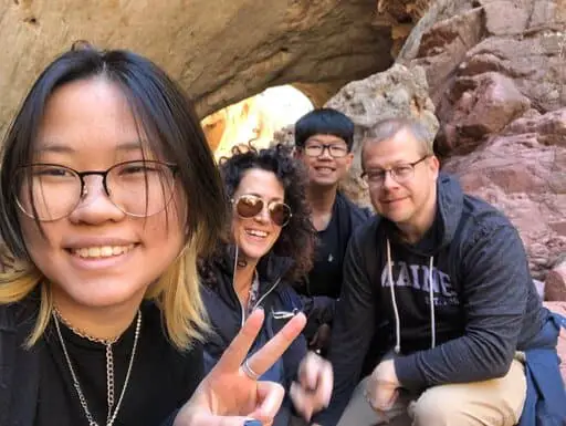 Allen, his wife and 2 teenage children in a cave